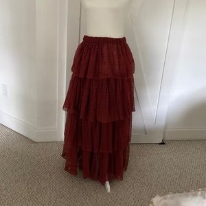Free people maxi ruffle skirt, color wine, tag as large but feels like 2x to me.